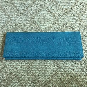 Turquoise clutch with mirror on inside